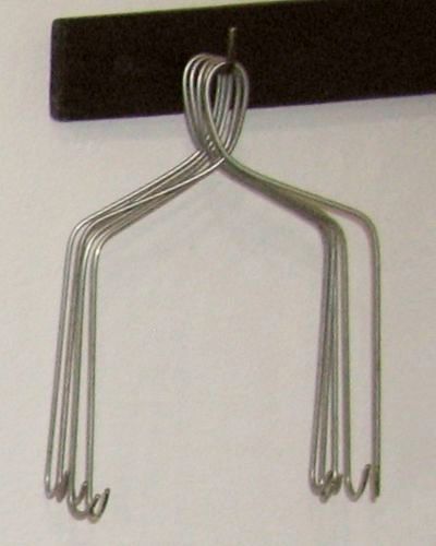Silver mask hangers.