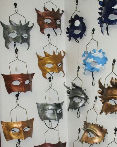 Masks hanging on mask hangers.